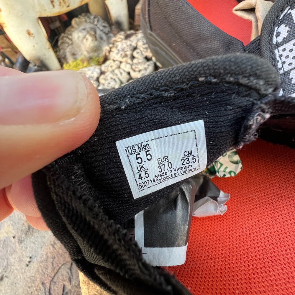 Vans Black and White Patterned Slip-On Sneakers - Picture 10 of 10